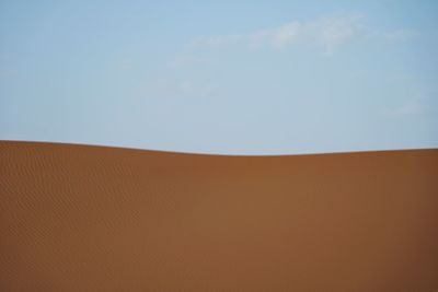 Scenic view of desert against clear sky