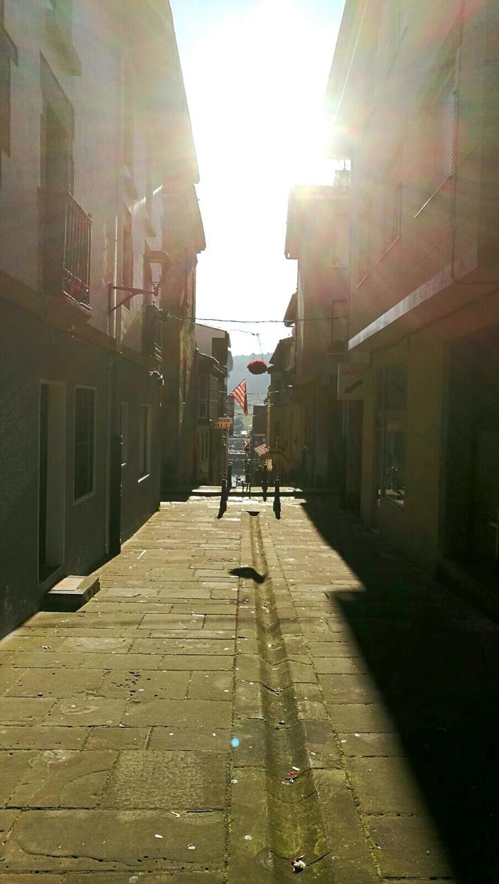 MAN WALKING IN CITY