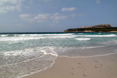 Scenic view of beach against sky