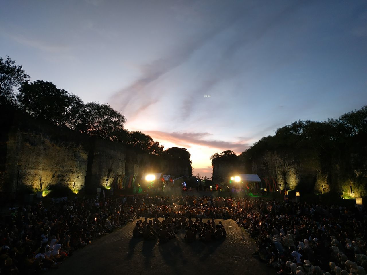 GROUP OF PEOPLE AT SUNSET