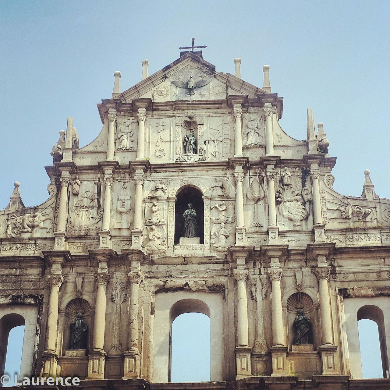 architecture, built structure, low angle view, building exterior, clear sky, arch, history, famous place, travel destinations, tourism, religion, travel, international landmark, sculpture, old, facade, statue, place of worship, spirituality