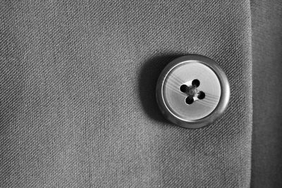 Close-up of shirt button