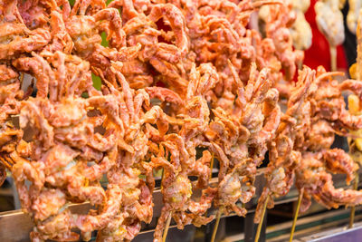 Deep fried soft shell crabs on stick