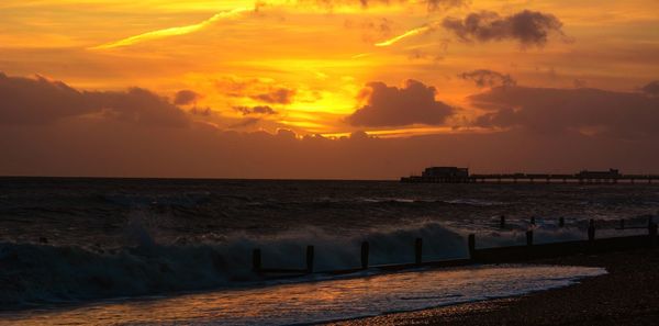 Scenic view of sea against sky during sunset