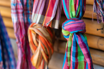 Close-up of multi colored scarfs for sale in market