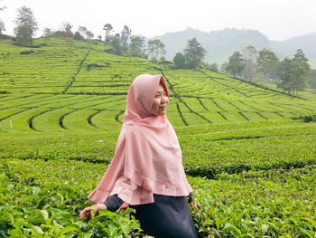 Woman standing in farm