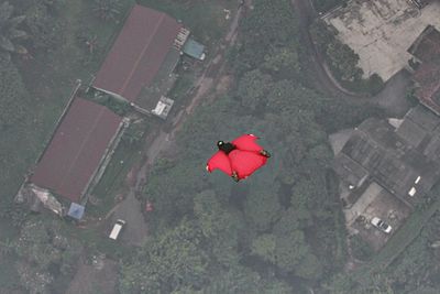 High angle view of sky diver in city