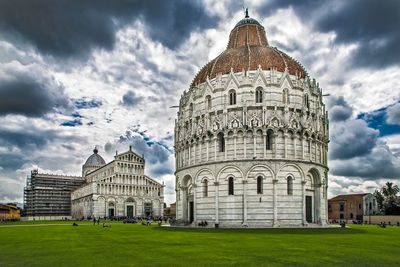 Unique view of piazza dei miracoli baptistery, cathedral and leaning tower, pisa, tuscany, italy