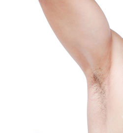 Midsection of man against white background