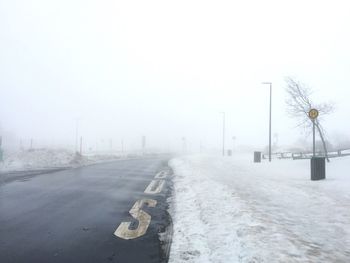 Road against sky during winter