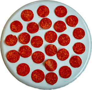 High angle view of pizza in glass over white background