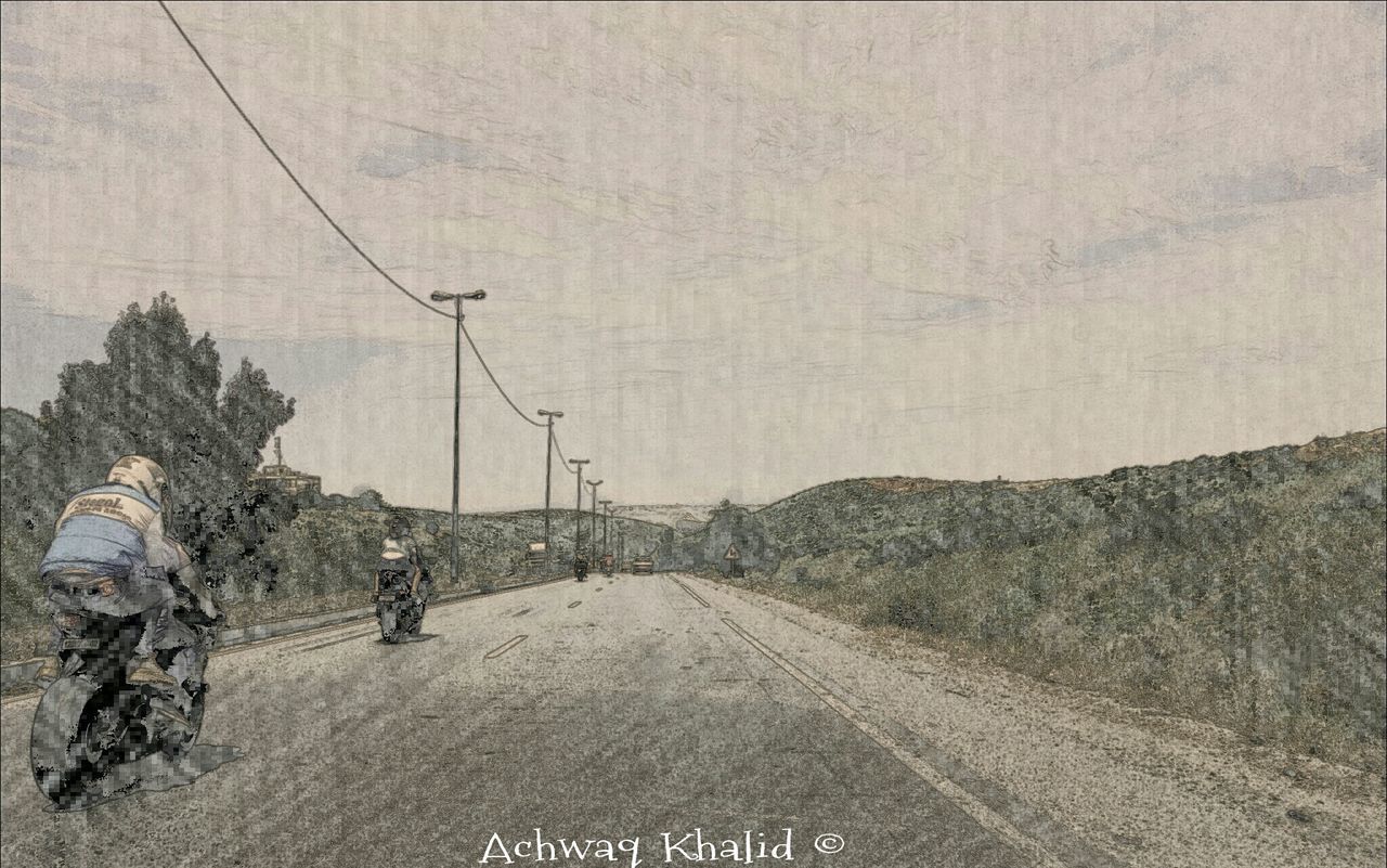 WOMAN WALKING ON ROAD