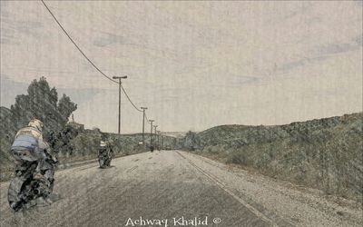 Woman walking on road