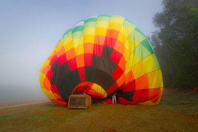 Colorful hot air balloon on landscape