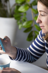 Young woman using mobile phone