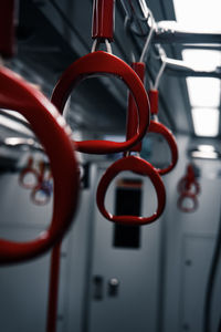 Red handle grip inside train