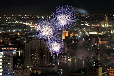 Firework display at night