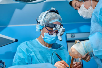 Midsection of man wearing mask