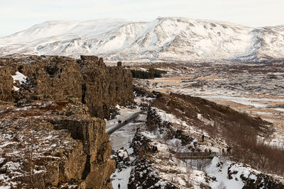 Scenic view of snowcapped mountains during winter