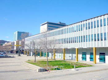 Modern building against clear blue sky