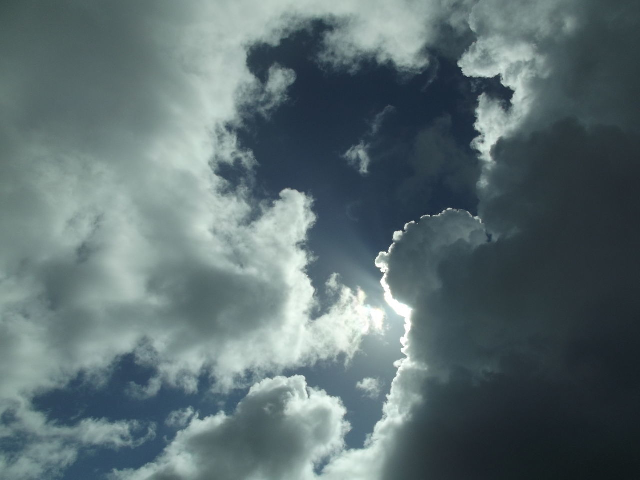 sky, low angle view, cloud - sky, sky only, beauty in nature, cloudy, tranquility, scenics, nature, cloudscape, tranquil scene, cloud, backgrounds, weather, blue, idyllic, white color, full frame, outdoors, fluffy