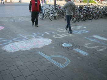 Low section of people standing on footpath