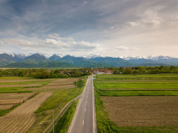 Picturesque view with a traditional romanian village from transylvania, close to fagaras mountains