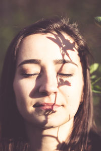 Close-up portrait of young woman