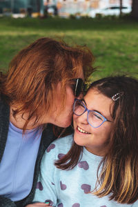 Portrait of young woman wearing sunglasses