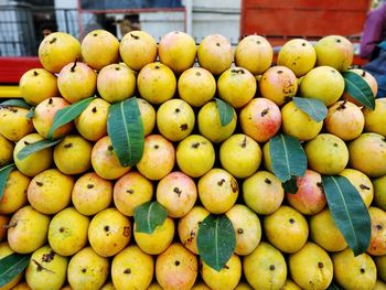 Full frame shot of mangoes for sale at market stall