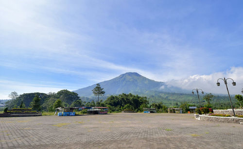 Mountain sumbing - clean natural mountain scenery with bright blue sky with countryside below