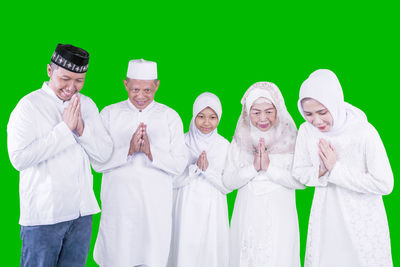 Group of people against white background