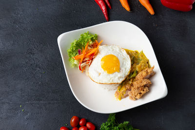 High angle view of breakfast served on table