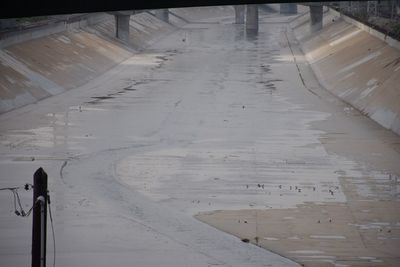 High angle view of empty road in winter