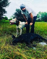 Full length of a dog on field