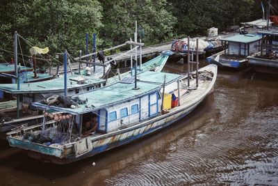 Panoramic view of boats moored in water