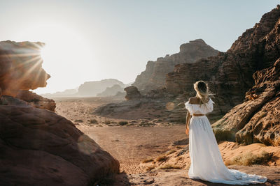 Statue of woman against clear sky