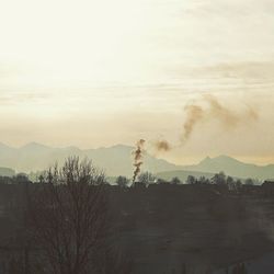 Scenic view of mountains against sky during sunset