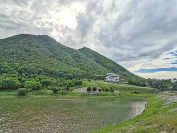 Scenic view of landscape and mountains against sky