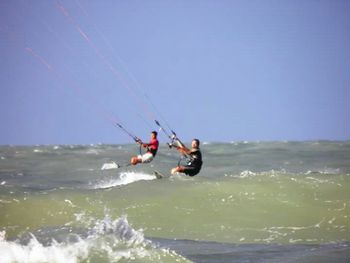 Person surfing in sea