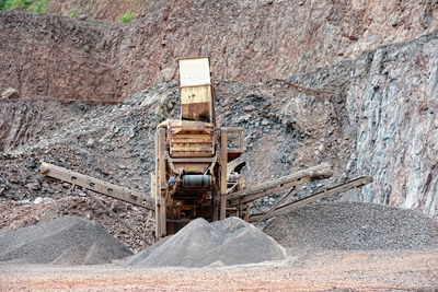 Stone crusher machinery at open-pit mine