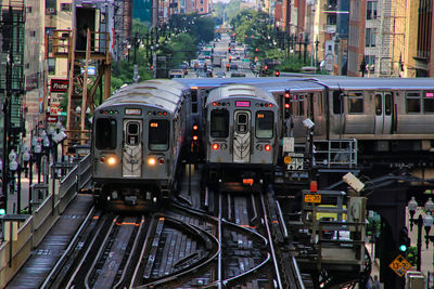 Train on railroad tracks in city