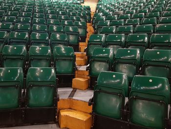 Empty green seats in stadium