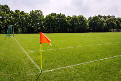 Scenic view of soccer field against sky