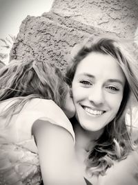 Portrait of smiling young woman