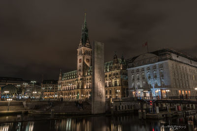 Illuminated buildings in city at night