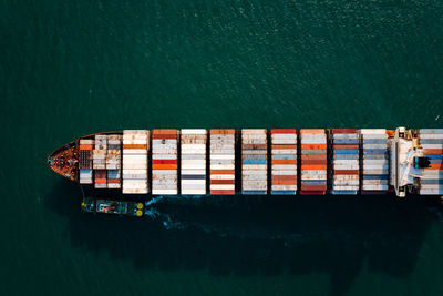 High angle view of container ship in sea