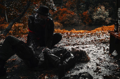 People sitting in park during winter