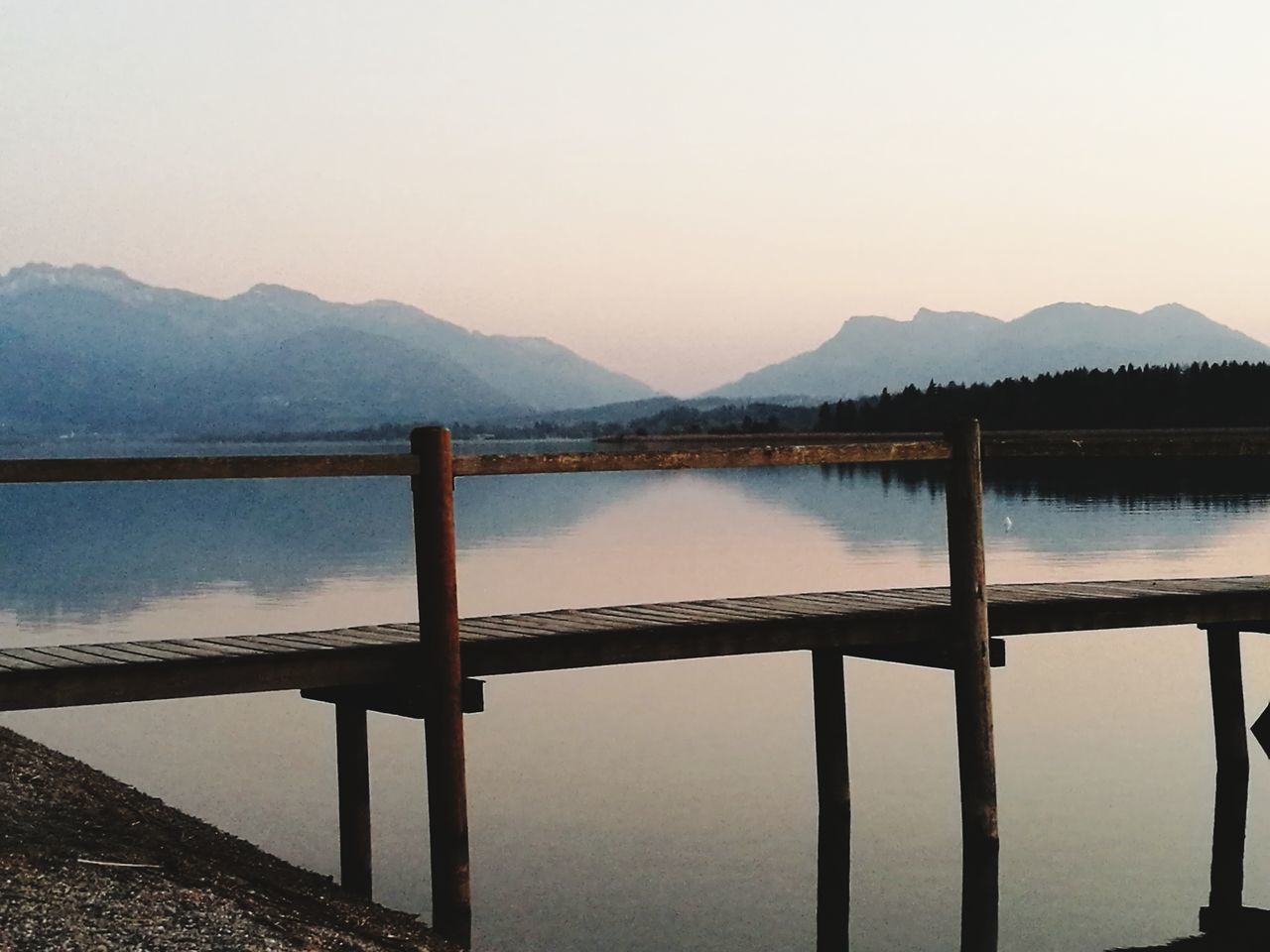 water, mountain, nature, mountain range, lake, sunset, tranquil scene, beauty in nature, scenics, tranquility, sky, no people, outdoors, day, landscape