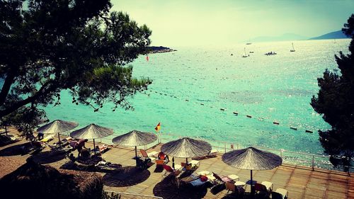 High angle view of people on beach against sky